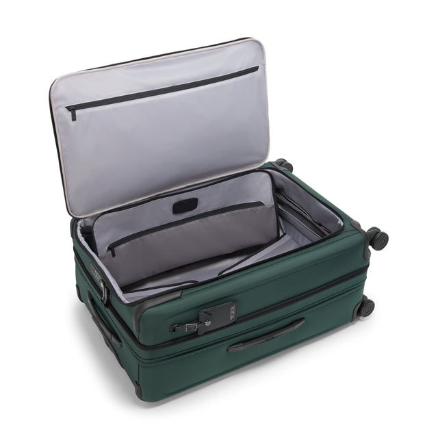 Angle. TUMI - Alpha Large Dual Access Expandable Checked Spinner Suitcase - Deep Pine.