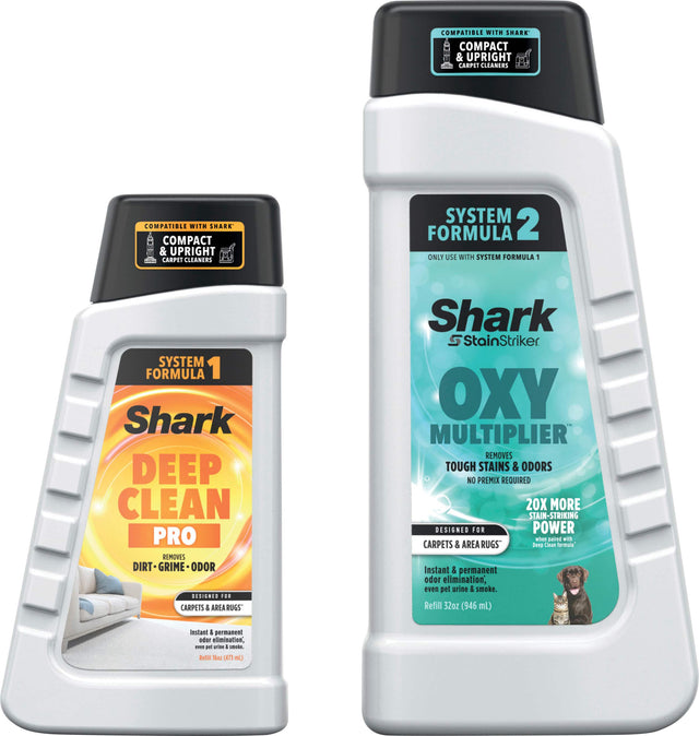 The image features two bottles of Shark carpet cleaning products. One bottle is labeled "Deep Clean Pro," while the other is labeled "Oxy Multiplier." Both bottles are designed for use with Shark Compact & Upright Carpet Cleaners and are compatible with System Formula 1. The products are intended for use on carpets and area rugs, providing instant and permanent odor elimination, as well as stain-striking capabilities. The bottles are placed next to each other, showcasing the variety of cleaning solutions of