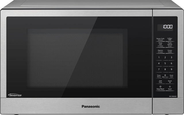 Panasonic microwave oven with a digital clock on the front.