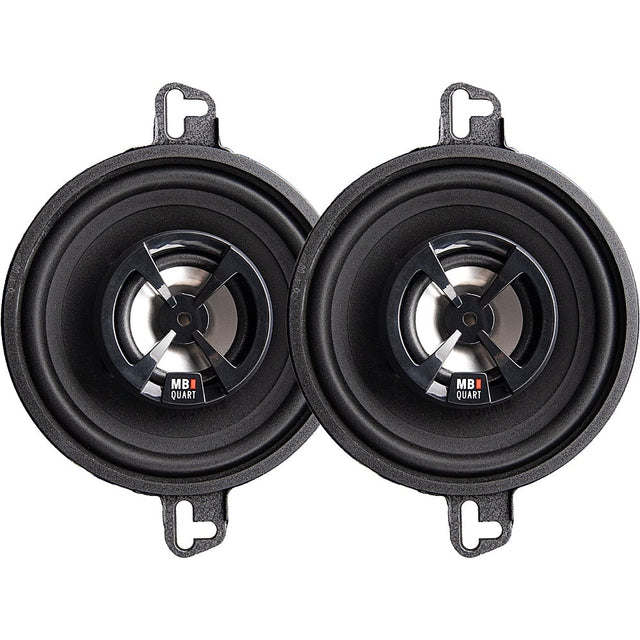 MB Quart is a brand of speakers that are known for their high-quality sound and durability. The image shows two MB Quart speakers, which are black and silver in color. These speakers are designed to provide an excellent audio experience, making them a popular choice for car audio systems and home entertainment setups.
