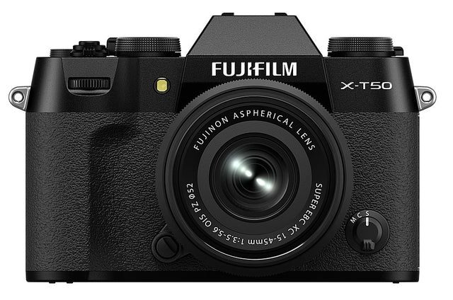 The image features a close-up of a FUJIFILM X-T50 camera lens. The lens is an aspherical FUJINON lens with a focal length of 15-45mm and a 1:3.5-5.6 aperture. The camera is designed for capturing high-quality images and is equipped with advanced features for professional photography. The lens is the main focus of the image, showcasing its details and capabilities.
