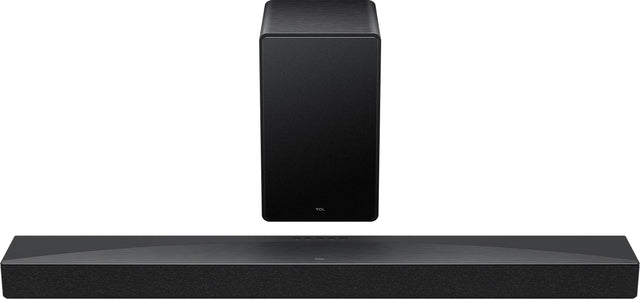 TCL is a company that manufactures and sells electronic products, such as televisions, soundbars, and speakers. In the image, there is a TCL soundbar and speaker system, which includes a subwoofer and two speakers. The soundbar is placed on a stand, and the speakers are positioned on either side of it. This setup provides a complete audio system for an entertainment system, enhancing the overall sound quality and experience for the user.