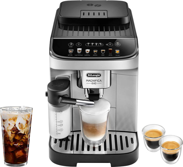 The image shows a coffee maker with a glass of iced coffee next to it. The coffee maker is made by Longhi and has a Magnifica EVO 2.0 model. The coffee maker is black and silver in color. There are also two cups of coffee and a glass of iced coffee on the counter.