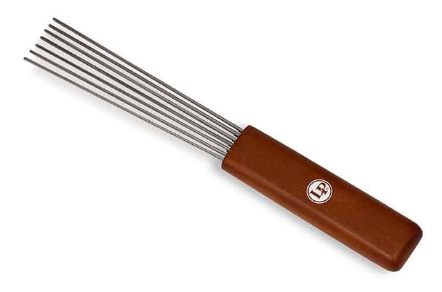 Front. Latin Percussion - Merengue Guiro Scraper Wood with 7 Metal Tines, Ergonomic Handle, Lightweight Percussion Tool.
