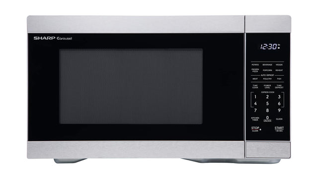 SHARP Carousel

12:30

POTATO  
BEVERAGE  
VEGGIE  
FROZEN  
POPCORN  
RHEAT  
PIZZA  
AUTO DEFROST  
MEAT  
POULTRY  
FISH  

TIME  
COOK  
POWER  
TIME LEVEL  
DEFROST  

1  
2  
3  
4  
5  
6  
7  
8  
9  

KITCHEN  
0  

TIMER  
UNLOCK  
CLOCK  
STOP  
CLEAR  
START  
30 SEC