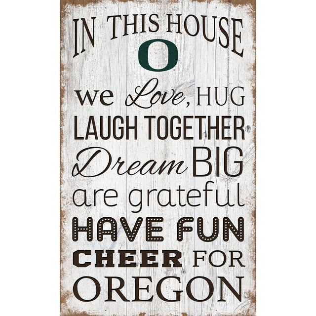 IN THIS HOUSE  
we Love, HUG  
LAUGH TOGETHER  
Dream BIG  
are grateful  
HAVE FUN  
CHEER FOR  
OREGON